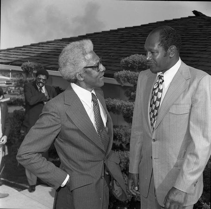 Left to right: Bayard Rustin (4th from left) poses with Los Angeles Chapter A. Philip Randolph Institute President Samuel McNeal, Jr. (left), LA County AFL-CIO Executive Secretary Sigmund Arywitz (3rd from left), Tom Bradley (5th from left), A. Philip Randal Institute Field Director Lois Felder (2nd from right), Arnett Hartsfield (right) and others during an event to honor Mr. Rustin at the home of singer Ray Charles, Los Angeles, 1973; Bayard Rustin talking with Tom Bradley, Los Angeles, 1973; Bayard Rustin standing between Sigmund Arywitz and Samuel McNeal, Jr., Los Angeles, 1973; Bayard Rustin, Gwen Green, and Ken Orduna standing together, Los Angeles, 1973. All photos by Guy Crowder ©Tom and Ethel Bradley Center