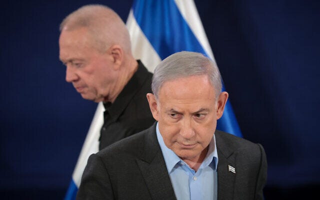 Prime Minister Benjamin Netanyahu (foreground) and Defense Minister Yoav Gallant hold a press conference at the Defense Ministry in Tel Aviv, December 16, 2023. (Noam Revkin Fenton/Flash90)