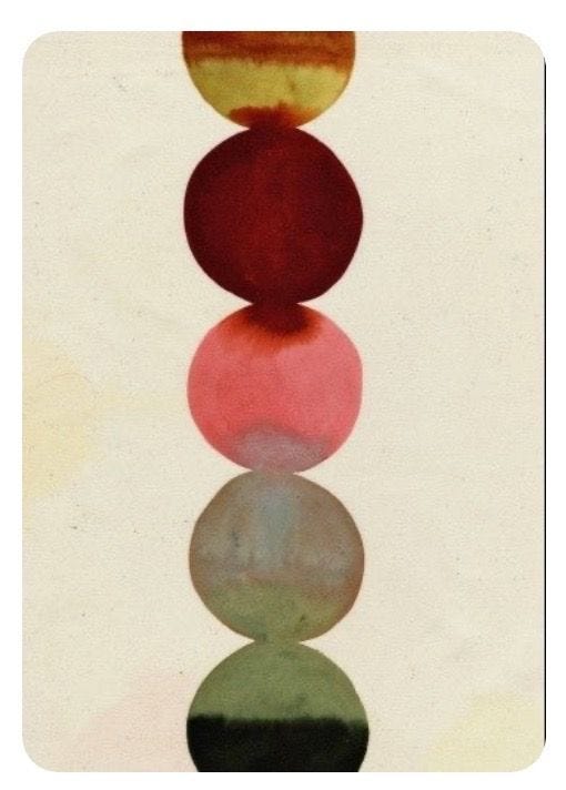 This may contain: four circles are arranged in the shape of a rainbow on a white background with black, red, yellow and green colors