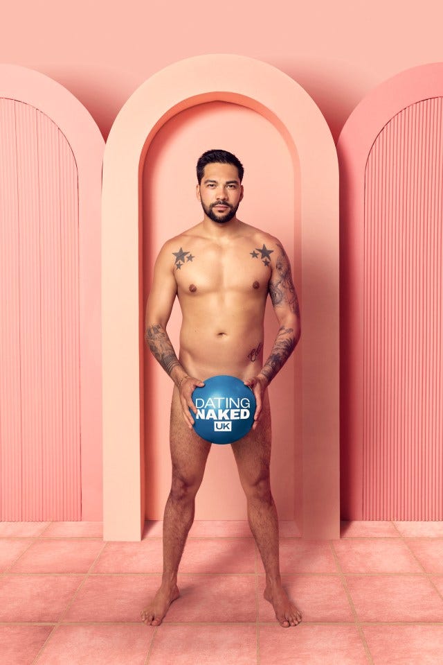 Matt Rylan Clark holding a Dating Naked UK logo ball.