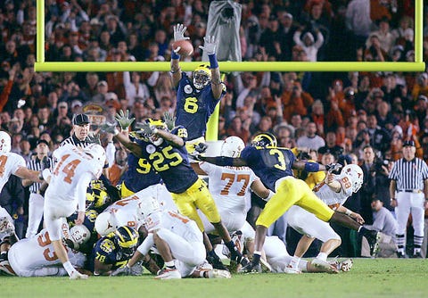 Longhorns gouge Wolverines with FG - Taipei Times