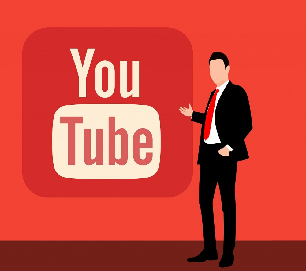 Desenho de homem de terno ao lado da logomarca do Youtube Desenho de homem de terno ao lado da logomarca do Youtube