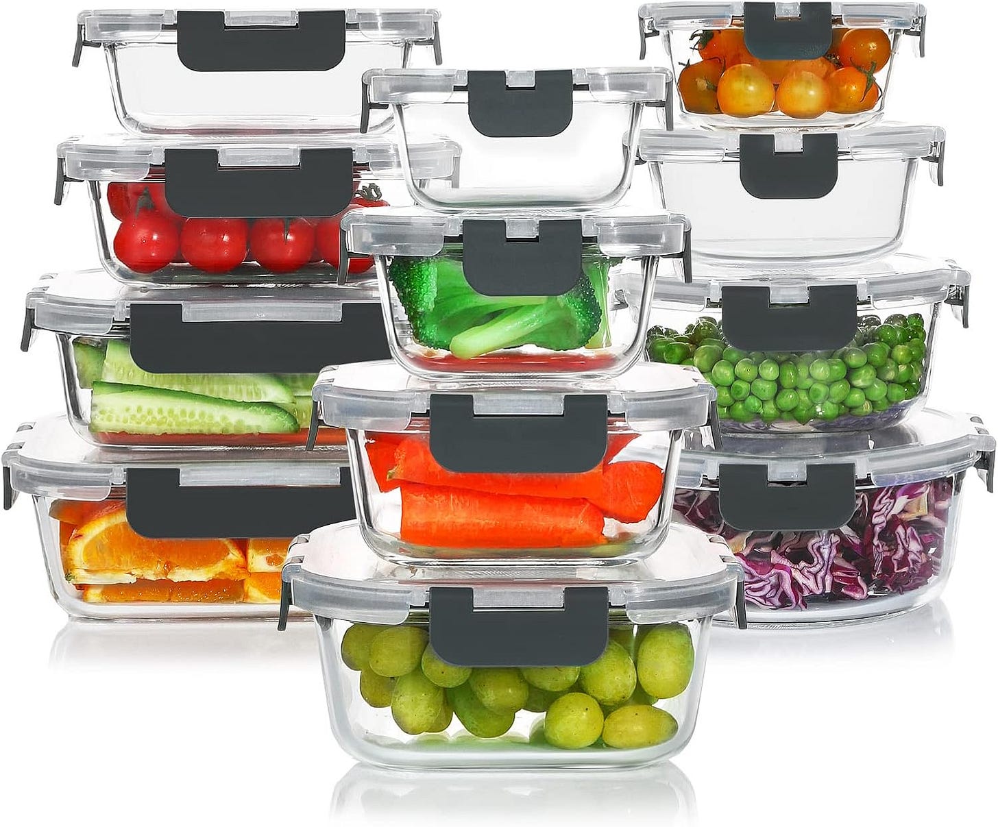 a stack of glass food containers with veggies and fruit inside