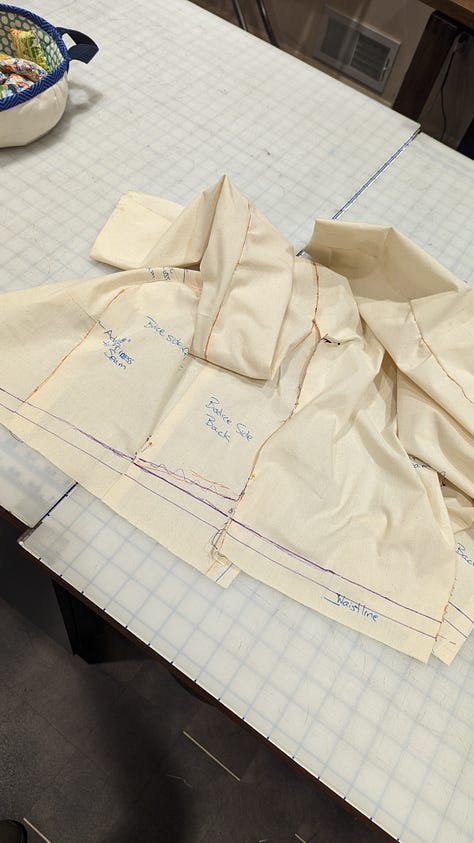 a muslin with alteration notes, an in progress quilt, a finished tote bag