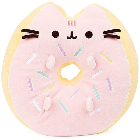 Photograph of a cushion in the shape of a donut, decorated with the popular cat character Pusheen