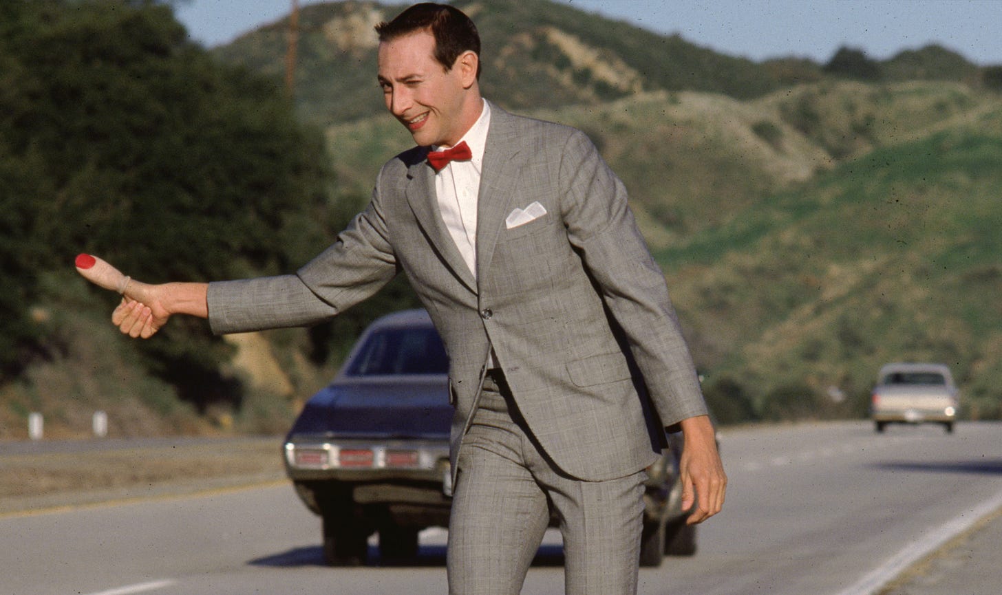 Paul Reubens thumbing it in character in "Pee-Wee's Big Adventure" (1985)