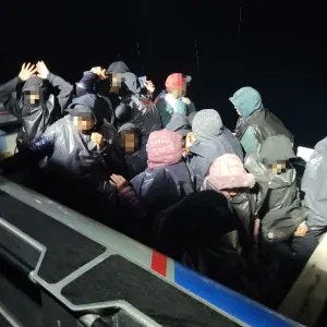 A cartel smuggling boat with 17 illegal aliens aboard surrenders to CBP Agents off San Clemente Island, California
