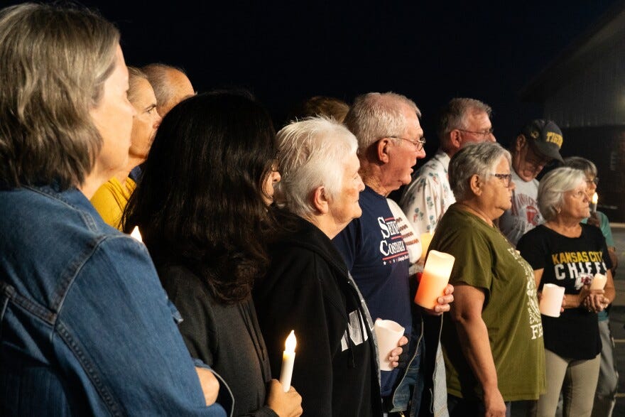 Around 50 mourners gathered outside the Ste. Genevieve Sherrif’s Office and Detention Center for a vigil remembering Leo Cruz-Silva on Sunday, Oct. 12, 2025. Abide in Love Ste. Genevieve, a local immigration reform nonprofit that connects detainees with community members outside the jail, organized Sunday’s remembrance.