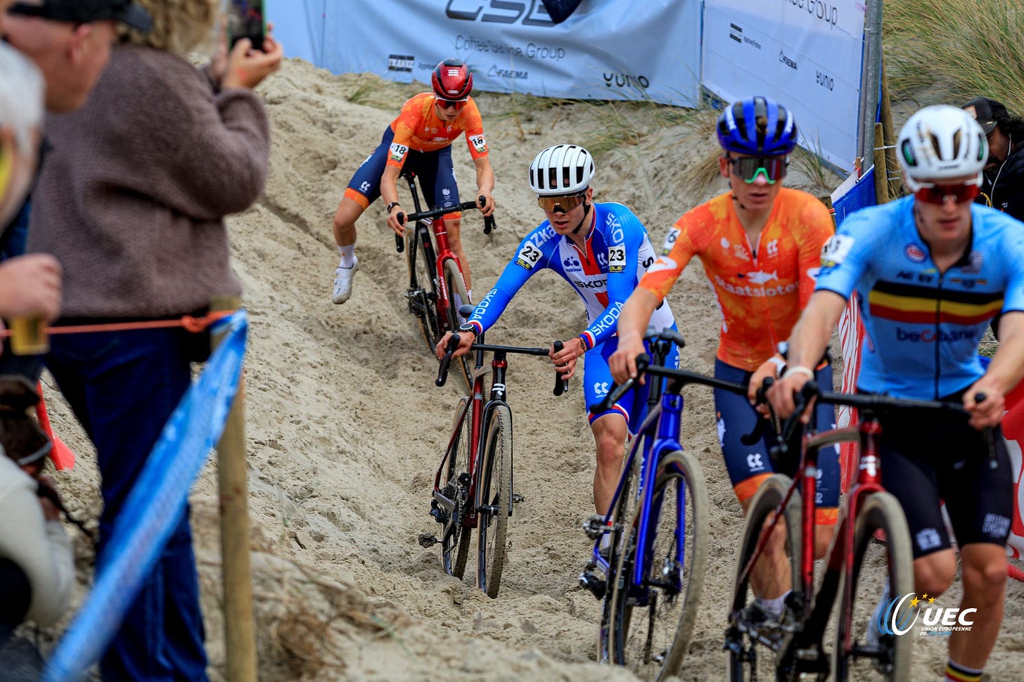 May be an image of bicycle and text