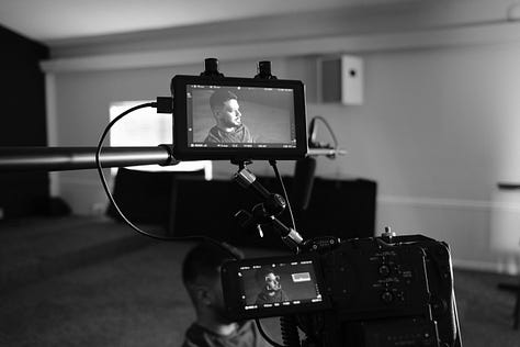 9 photos from the interview day with David. Photos feature Claire, Murray, Garrett, Jody, & David on set in the church sanctuary.