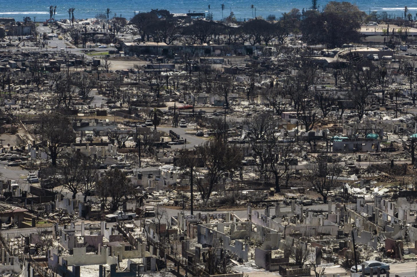 Charred remains of homes are visible following a wildfire in Lahaina, Hawaii, Aug. 22, 2023. 