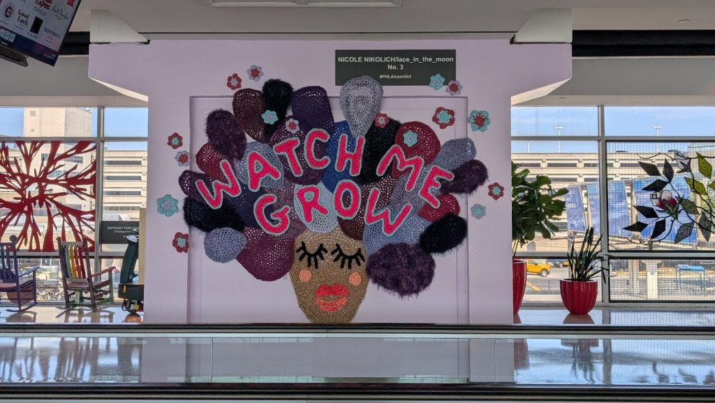 Art installation in Philadelphia airport that says 'Watch Me Grow'