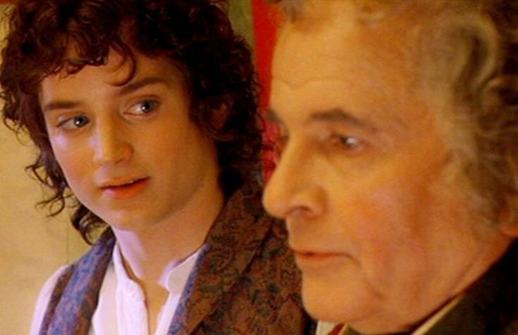 This may contain: an older man and young woman staring at each other