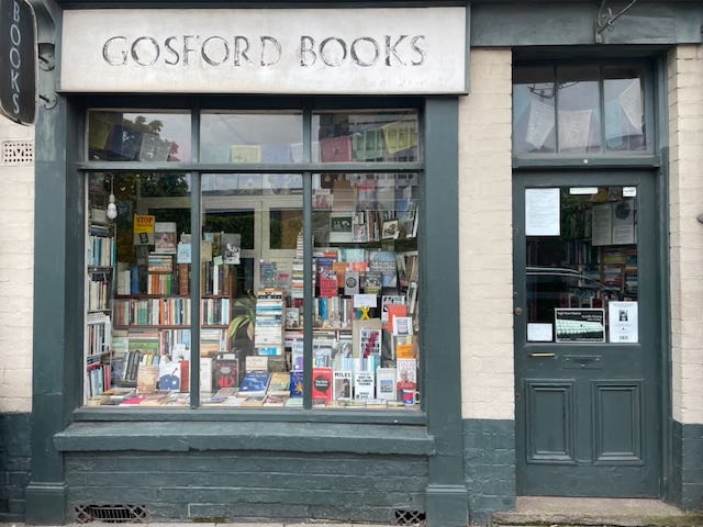 Image shows a photo of the front of a bookshop - Gosford Books - in Coventry, UK.