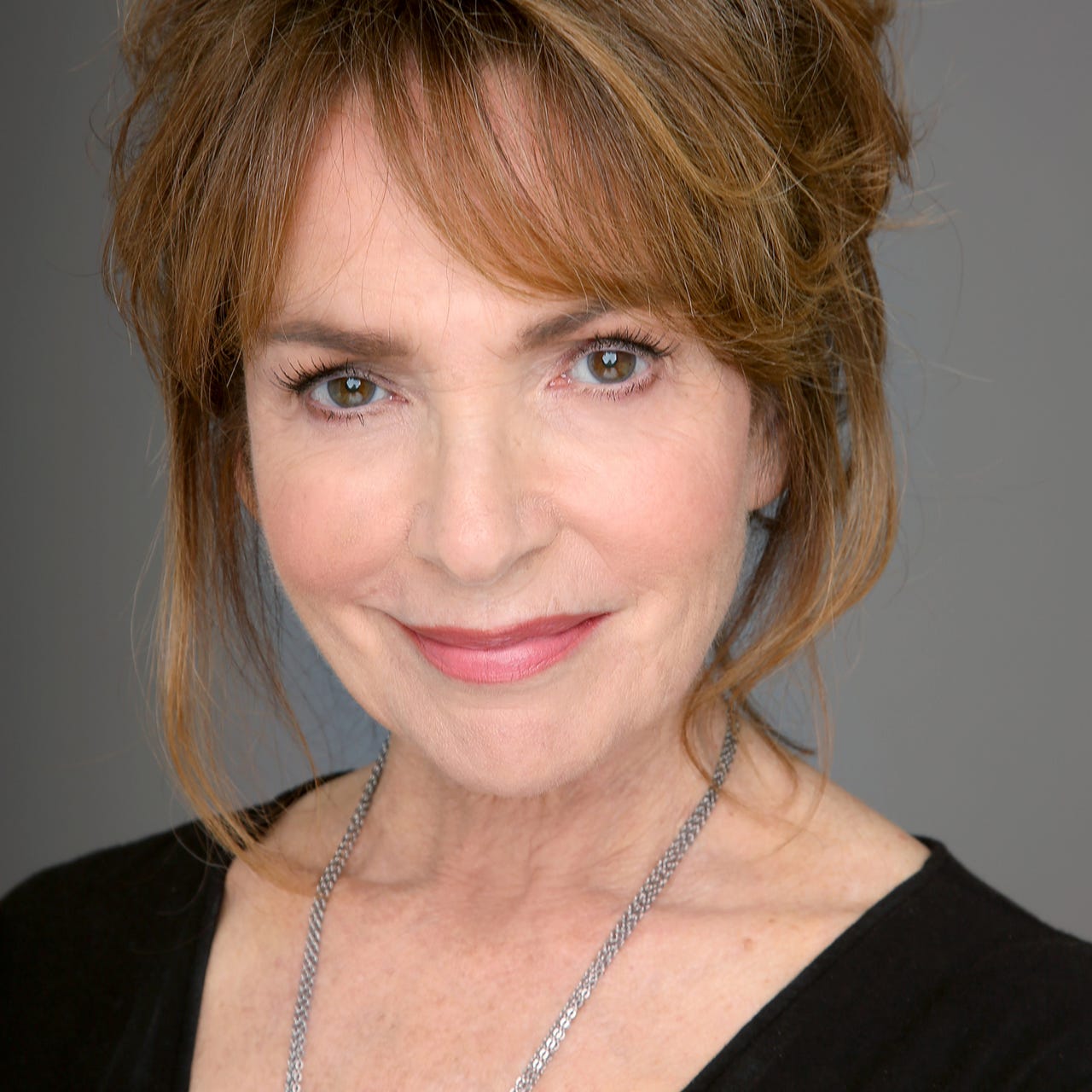 Melanie Chartoff logo