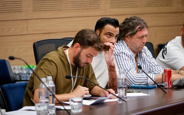 Itzik Saidyan (center) appears at a Knesset House Committee meeting in the Knesset on July 5, 2026. (Noam Moskowitz/Knesset Spokesman's Office)