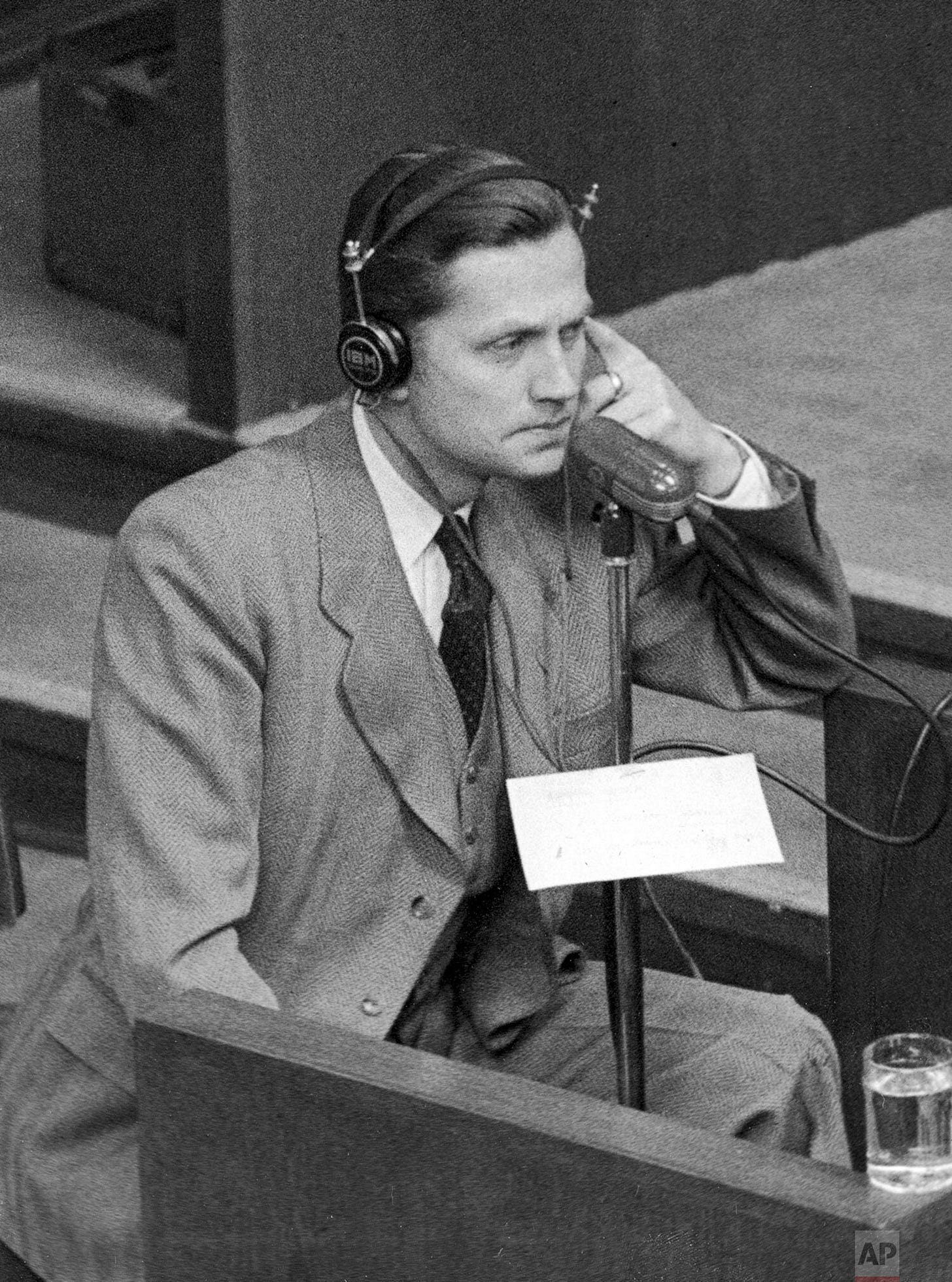 Former SS-Brigadefuehrer Walter Schellenberg, head of foreign intelligence, gives evidence from the witness box during the Nuremberg War Crimes Trials on January 4, 1946, offering insights into the Nazi regime's inner workings. Former SS-Brigadefuehrer Walter Schellenberg, head of foreign intelligence, gives evidence from the witness box during the Nuremberg War Crimes Trials on January 4, 1946, offering insights into the Nazi regime's inner workings.