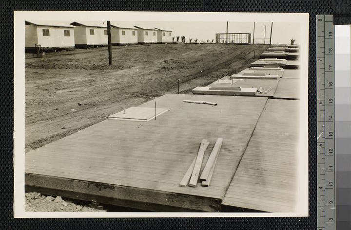 One shows a foundation with completed cabins in the background, another shows a frame without a roof, and no furniture. The third image is a completed house with porch viewed from the front, and the last is a furnished cabin with no roof to show the interior layout