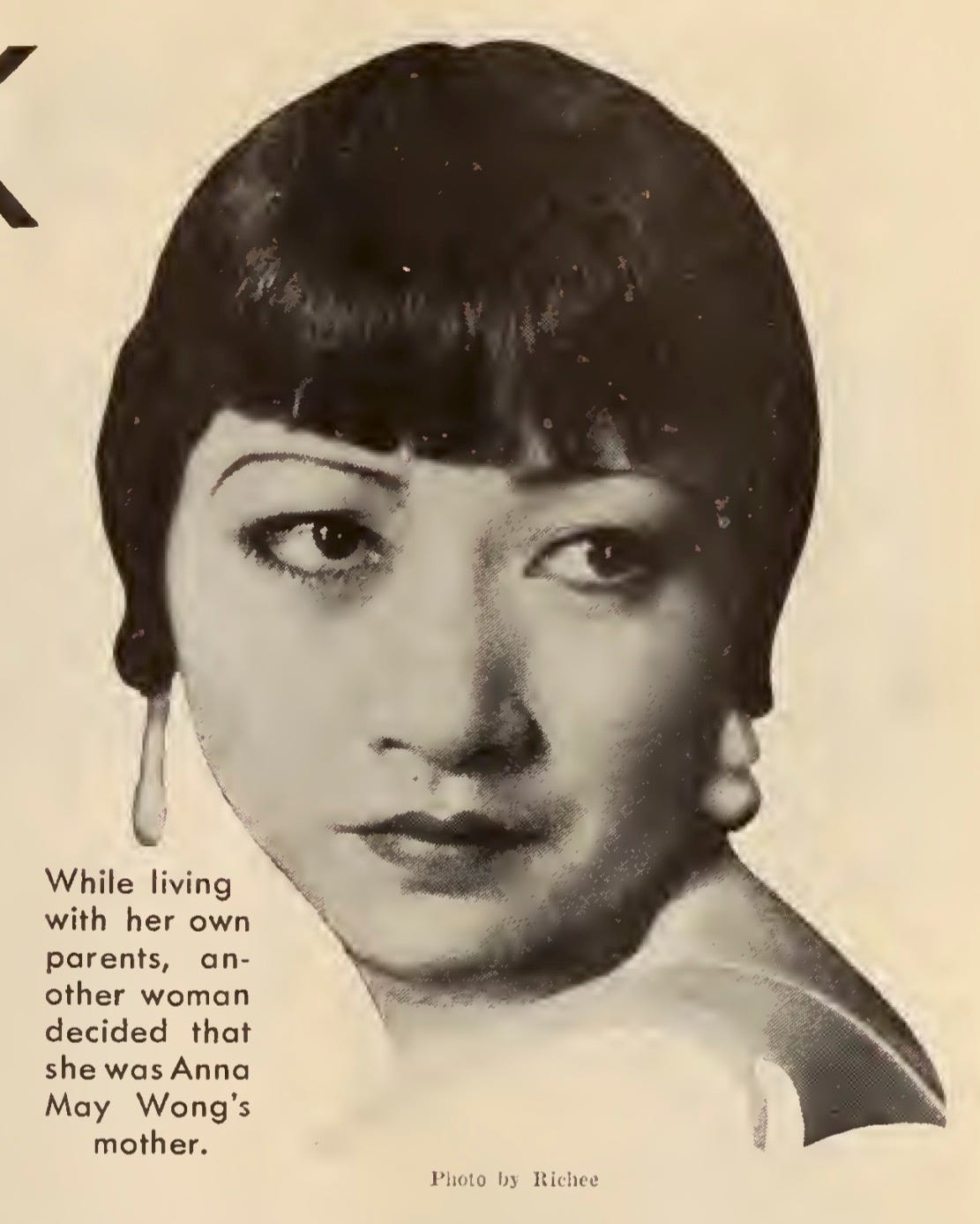 clipping from Picture Play, August 1932 with caption that reads: "While living with her own parents, another woman decided that she was Anna May Wong's mother."