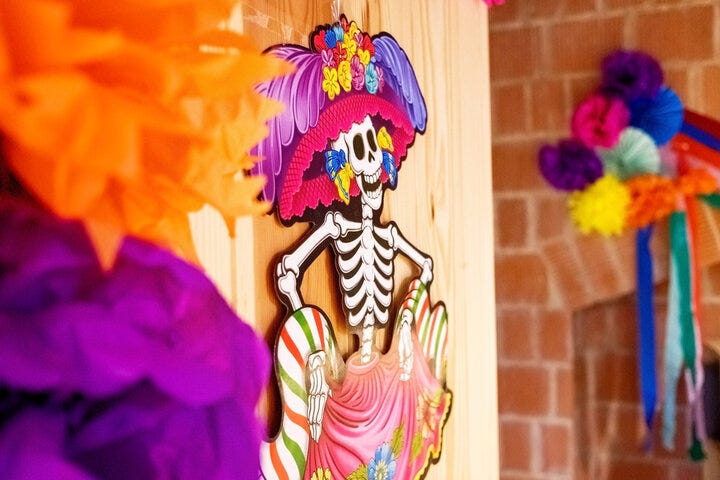 A funny skeleton decorates the door of a classroom on the day of the dead. A funny skeleton decorates the door of a classroom on the day of the dead.