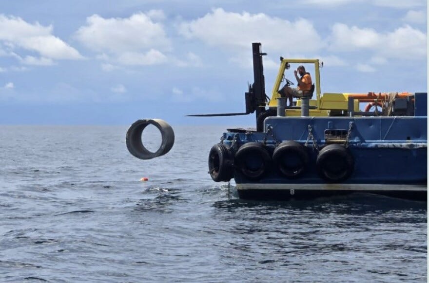 A worker unloads one of three million pounds worth of concrete culverts that created the Florida Coastal Corridor's second artifical reef this week off Fort Walton Beach A worker unloads one of three million pounds worth of concrete culverts that created the Florida Coastal Corridor's second artifical reef this week off Fort Walton Beach