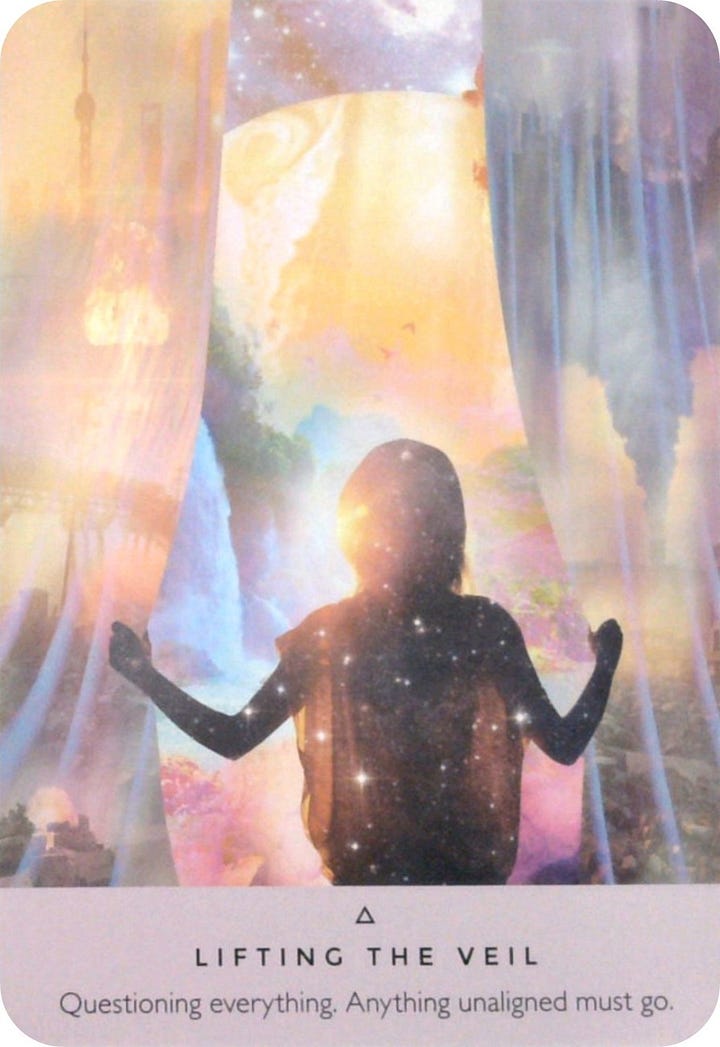 The Ace of Swords tarot card and the Lifting the Veil oracle card.