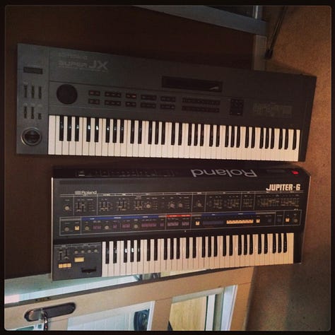 Inside a recording studio with lots of analog synthesisers. James Mottershead, Mark Cleator and Simon Campbell