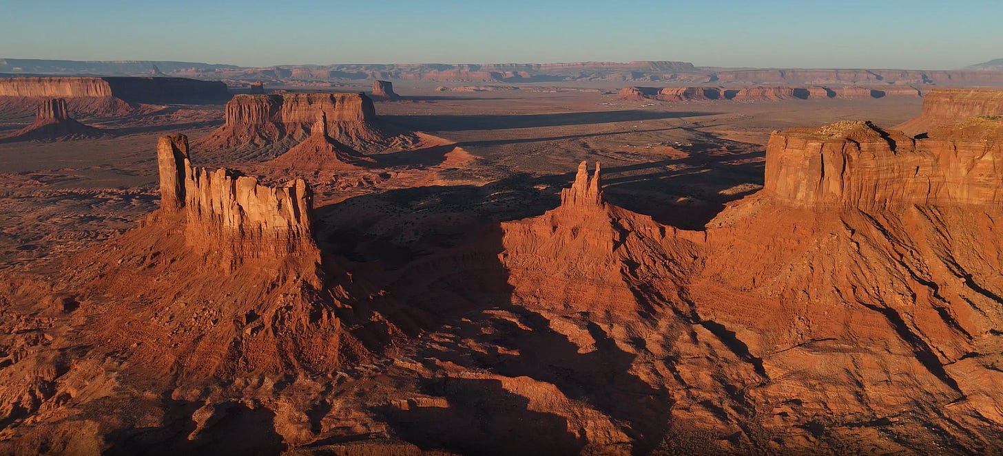 A large rocky landscape with blue sky
Description automatically generated A large rocky landscape with blue sky
Description automatically generated
