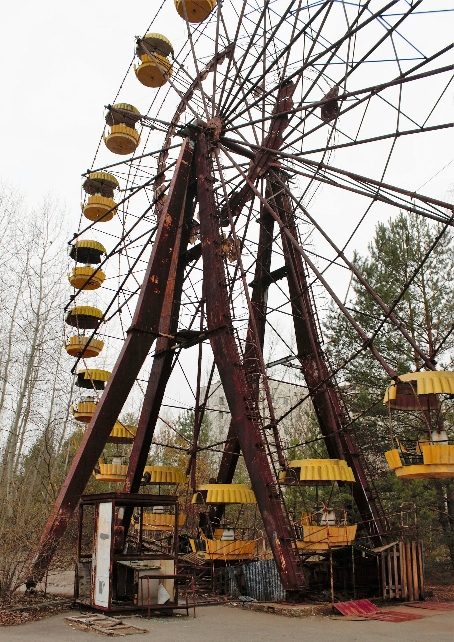 A rusted, abandoned ferris wheel.
