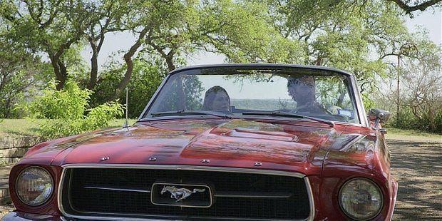 Walker Cordell and STella drive up in red Mustang to find Clint with gun. Walker Cordell and STella drive up in red Mustang to find Clint with gun.