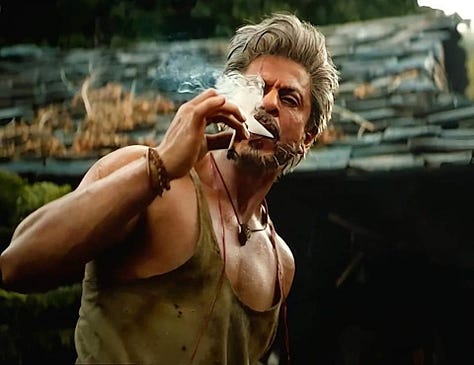 Shah Rukh Khan - the sexiest man alive. Big nose, dramatic eyebrows, dimples, and a six-pack at 58.