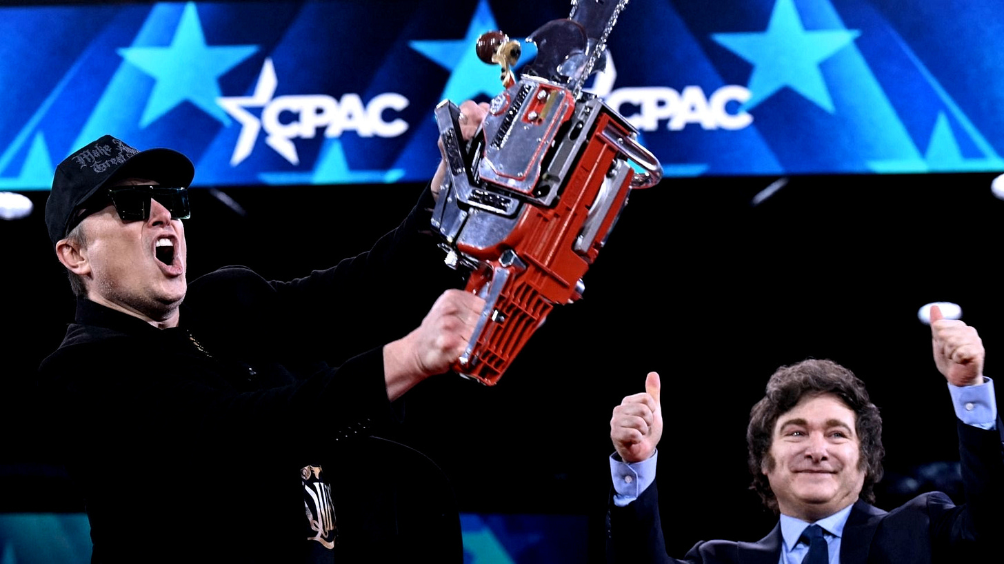 Elon Musk waves chainsaw gifted by Argentinian President Milei