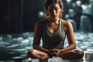 A_person_sitting_in_a_meditative_pose_surrounded_by_ice