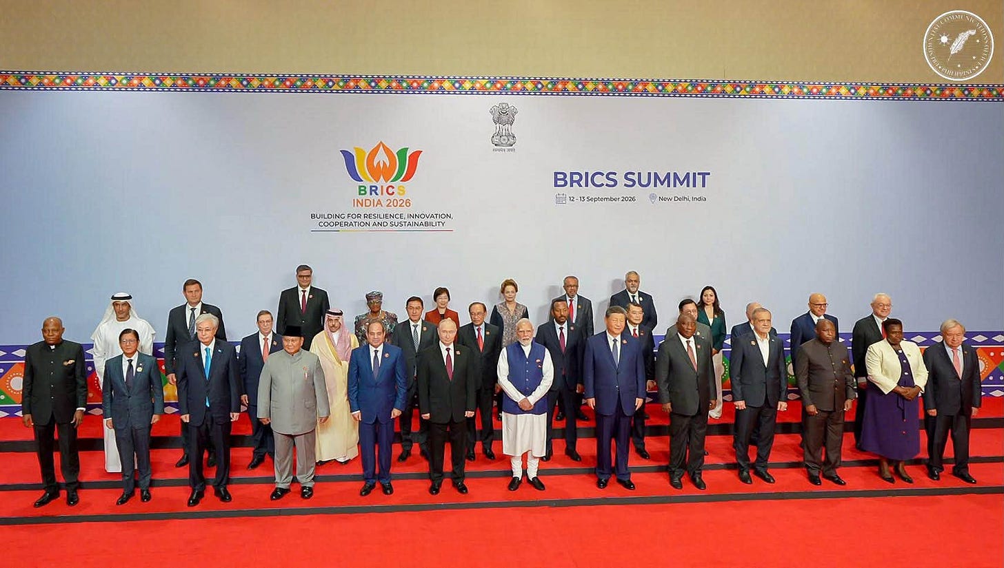 Leaders of BRICS member states, partner countries, and invitees took a group photo together before attending the 18th BRICS Summit