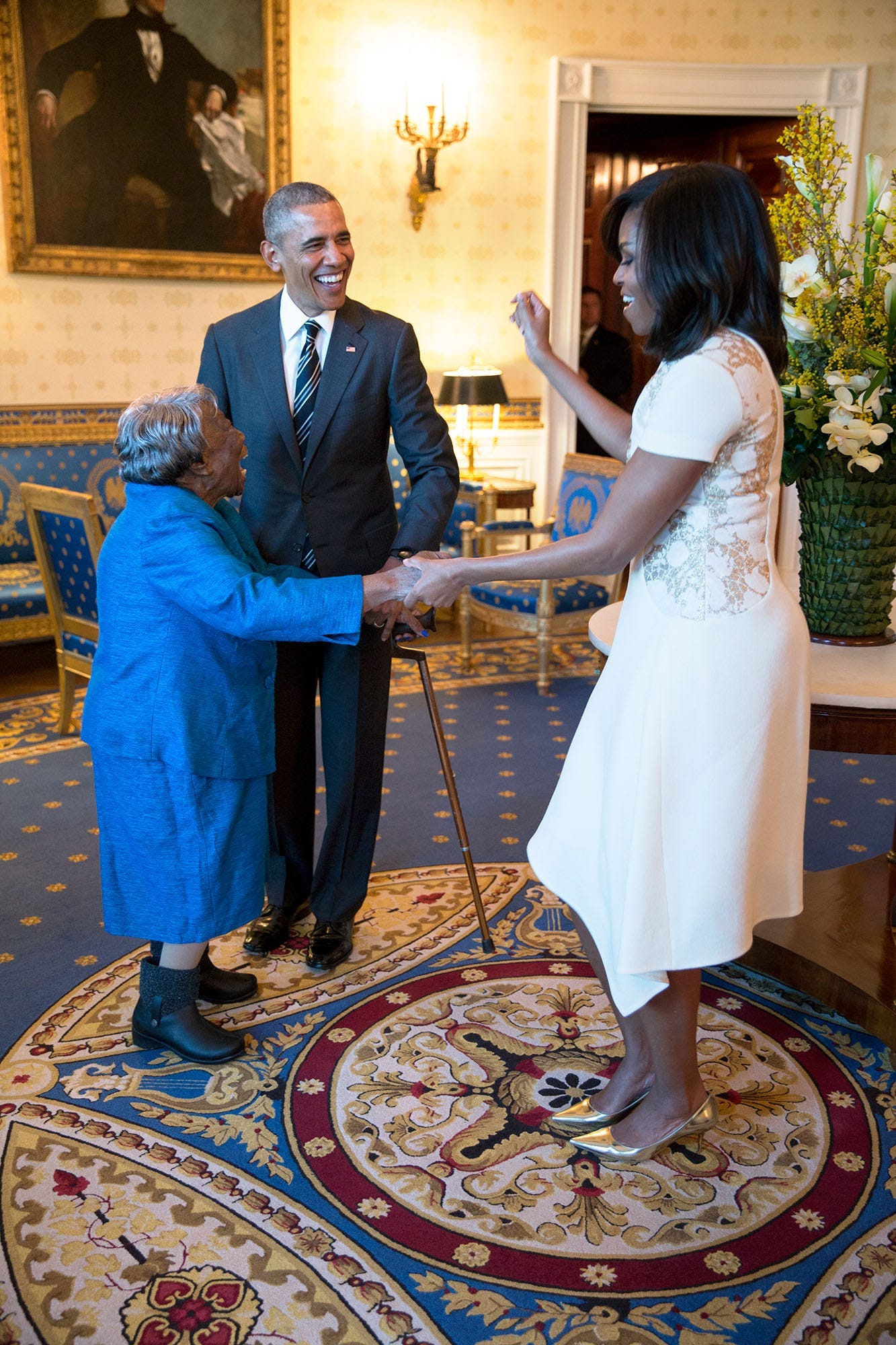 February 18, 2016: A joyous moment unfolds as President Obama watches First Lady Michelle Obama dance with 106-year-old Virginia McLaurin in the White House Blue Room, before an African American History Month reception. February 18, 2016: A joyous moment unfolds as President Obama watches First Lady Michelle Obama dance with 106-year-old Virginia McLaurin in the White House Blue Room, before an African American History Month reception.