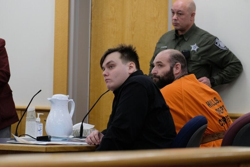 Christopher Hood, left, along with Leo Cullinan, during a hearing in March.