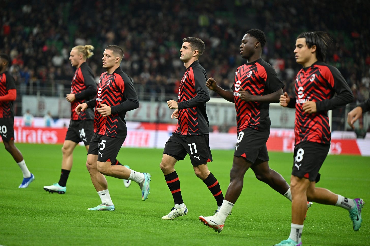 Players of AC Milan warm&nbsp;up ahead of a&nbsp;match between AC Milan and Juventus on October 22.