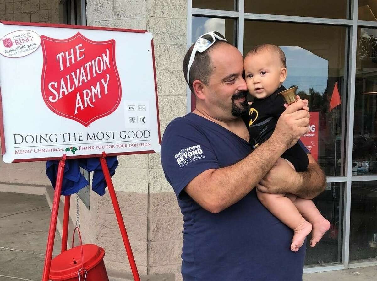 Dan Bradley and his son, Michael. Dan died suddenly last month, and his wife is awaiting the imminent birth of their sixth child. Dan Bradley was an EMT who responded to the Sandy Hook massacre. 