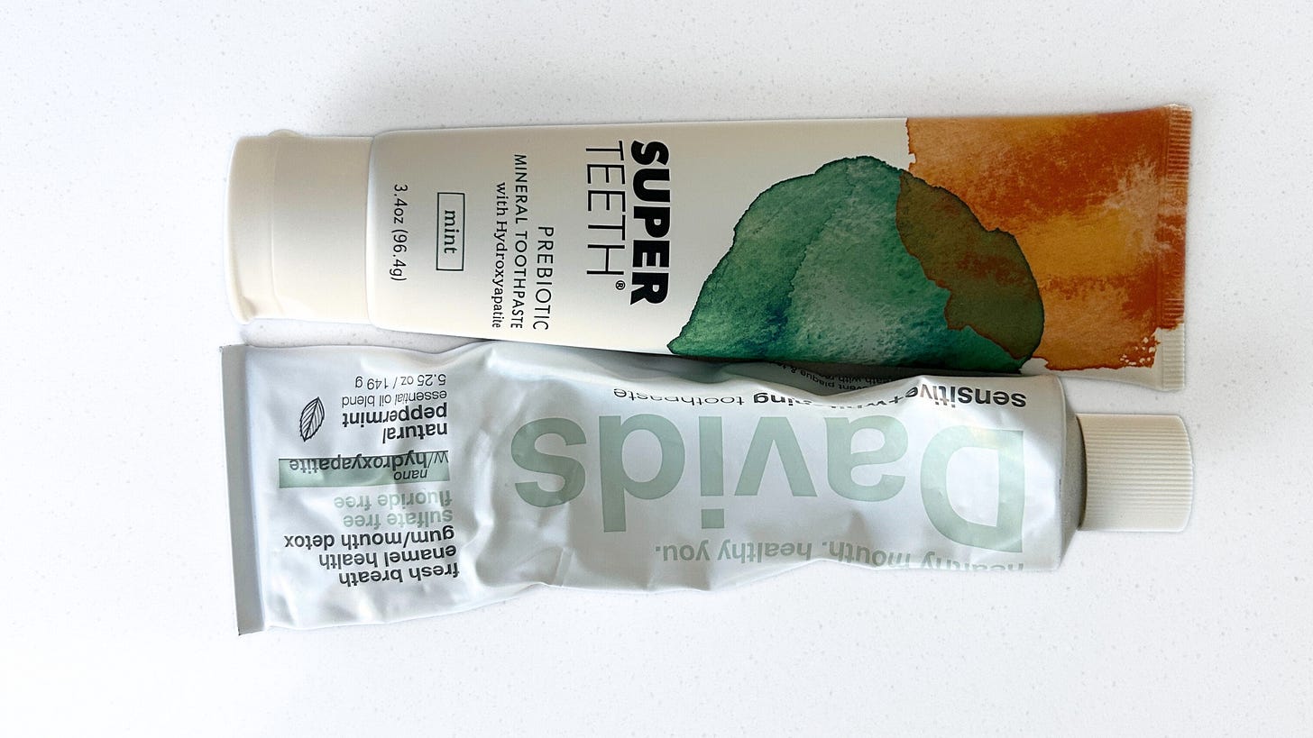 Two toothpaste bottles.