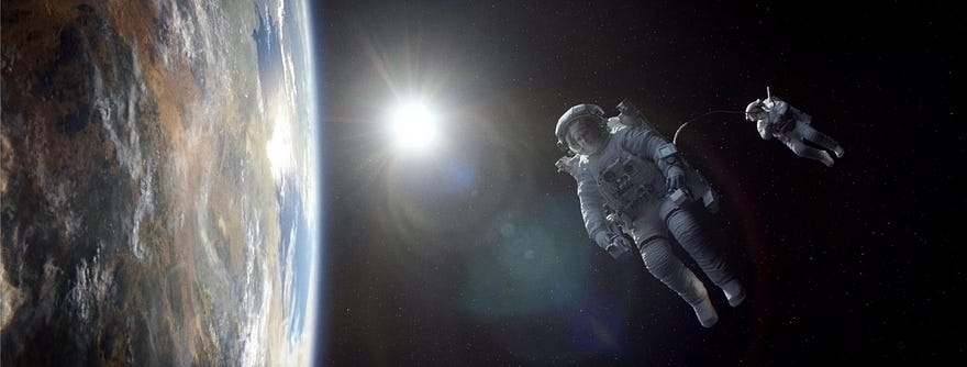 Sandra Bullock and George Clooney portraying astronauts in Gravity Sandra Bullock and George Clooney portraying astronauts in Gravity