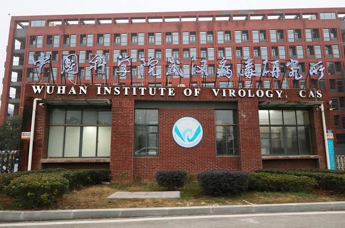 Red brick exterior of the Wuhan Institute of Virology with its name displayed on the building. Red brick exterior of the Wuhan Institute of Virology with its name displayed on the building.