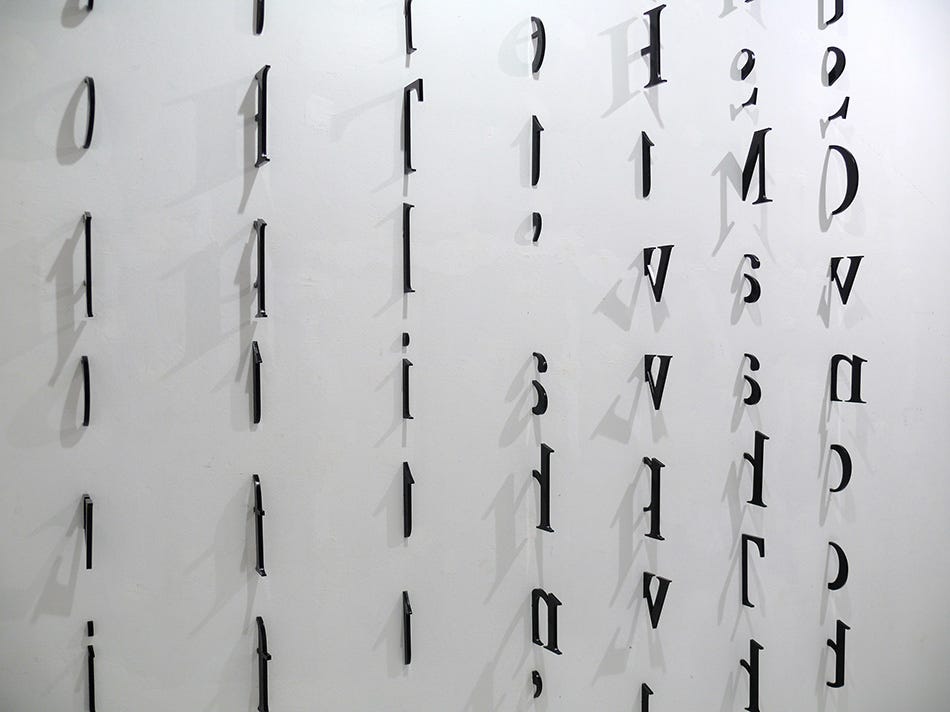 Marina Camargo, Untitled [Letras na parede], (acrylic), 2009 [Galeria Superfí­cie, São Paulo. © Marina Camargo]