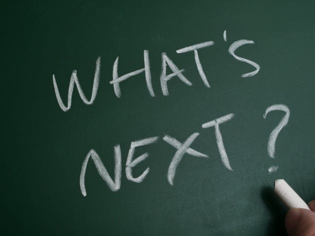 What next, text words typography written on chalkboard, life and business motivational inspirational