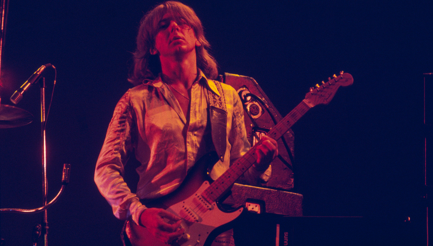 Mick Ralphs performs onstage with Bad Company at Earl&#039;s Court in London in July 1977