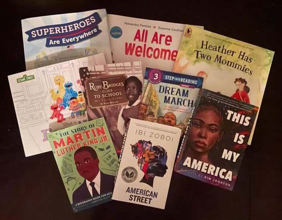 A variety of children's books featuring diverse characters