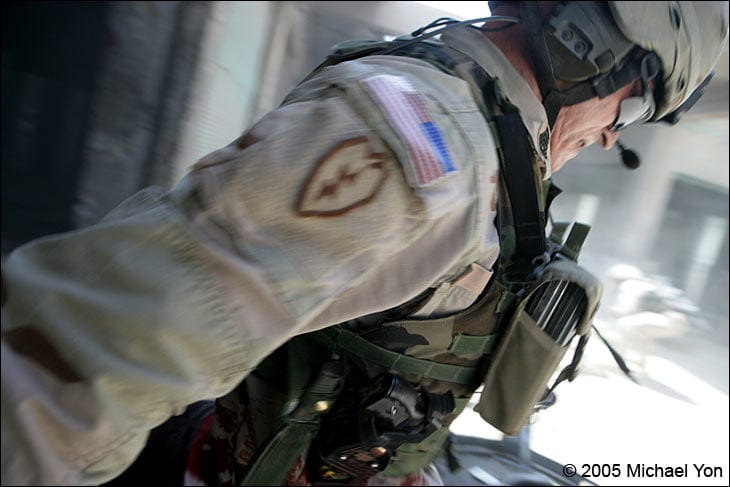 CSM Prosser drags the terrorist into the alley …