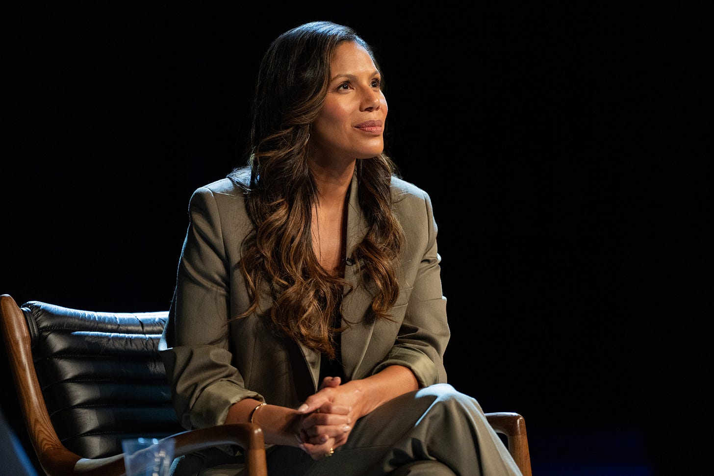 Merle Dandridge as Amanda Vonn in The Rainmaker Season 2 Episode 1 "Dear Uncle Rudy" on stage hosting a law seminar Merle Dandridge as Amanda Vonn in The Rainmaker Season 2 Episode 1 "Dear Uncle Rudy" on stage hosting a law seminar