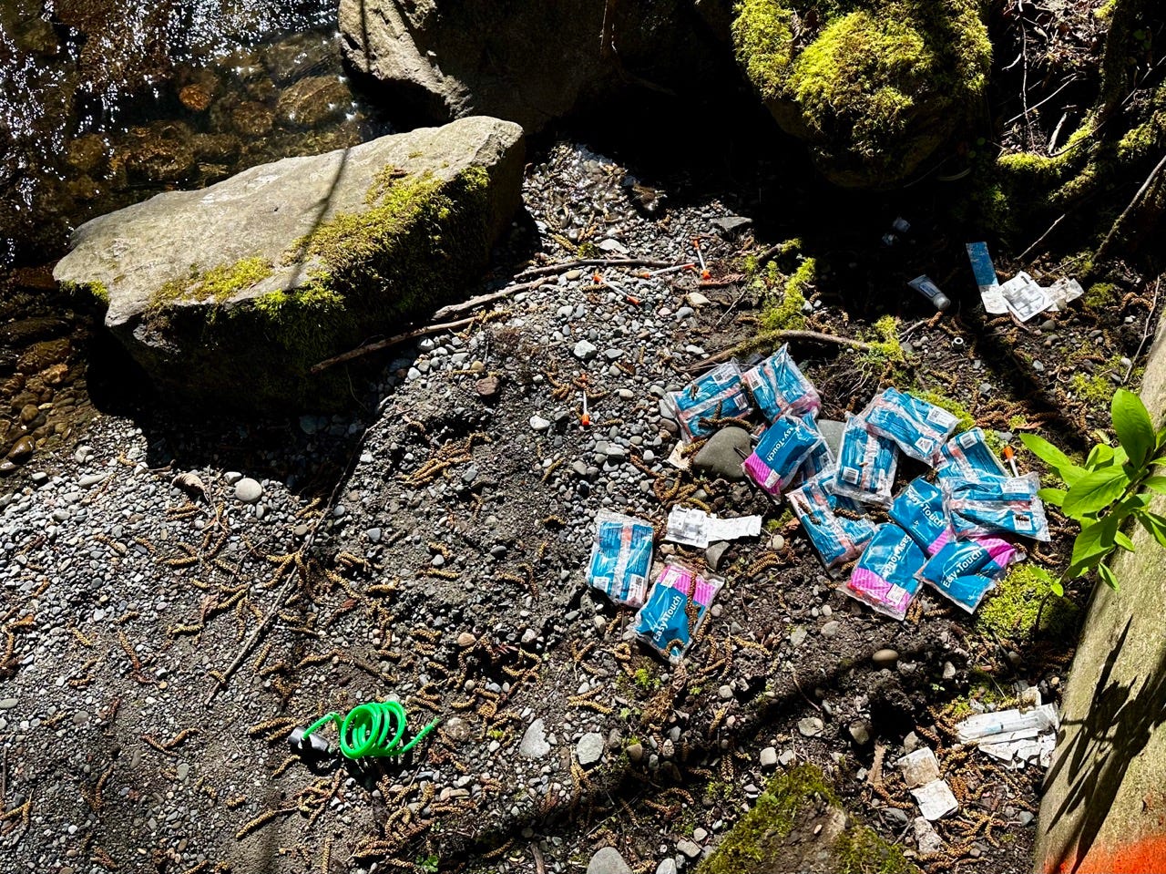 A pile of plastic bags on the ground
Description automatically generated A pile of plastic bags on the ground
Description automatically generated