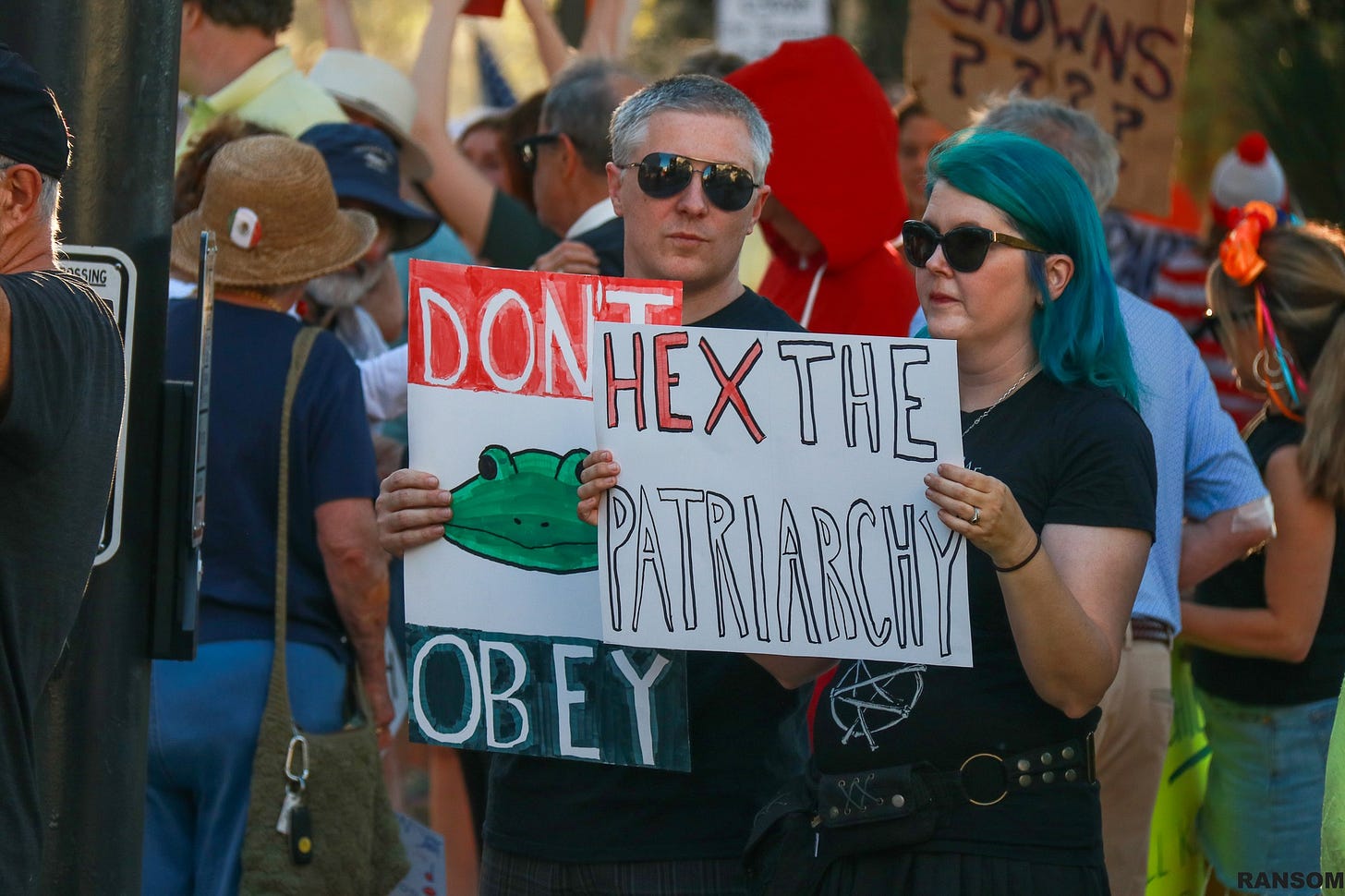 May be an image of crowd and text that says 'DONTEXTHE DONTE THE PATKLARCNN OBEY'