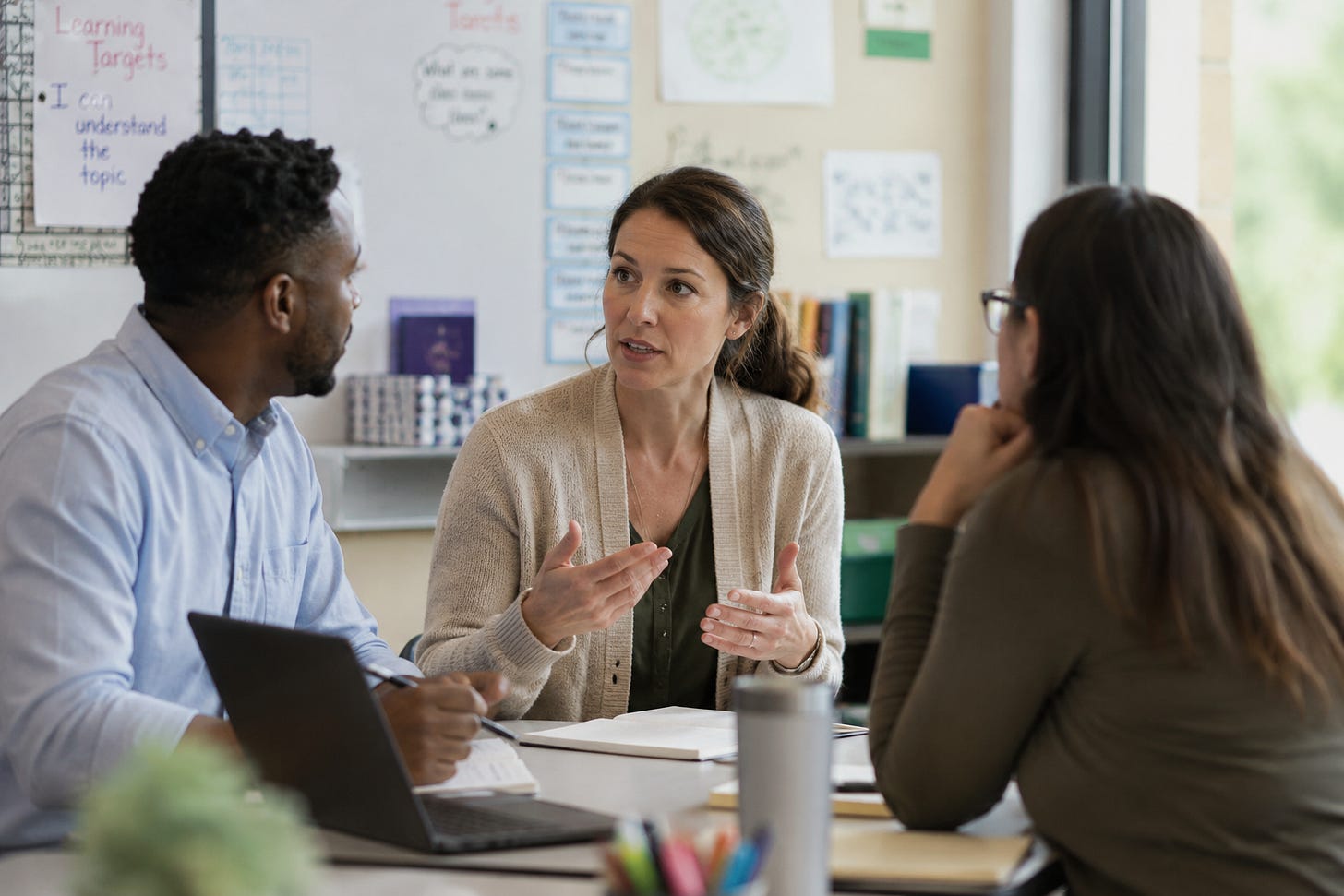 teachers talking attentively